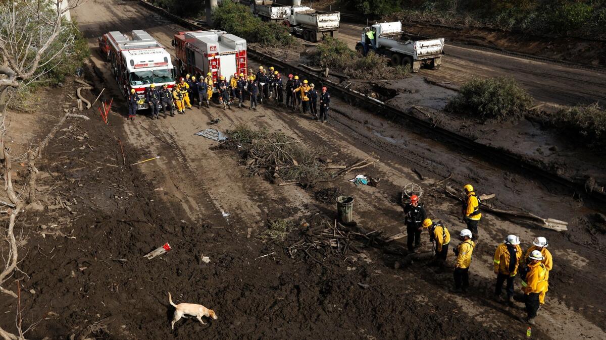 The search continued for possible victims along Highway 101 at Olive Mill Road in Montecito on Tuesday.