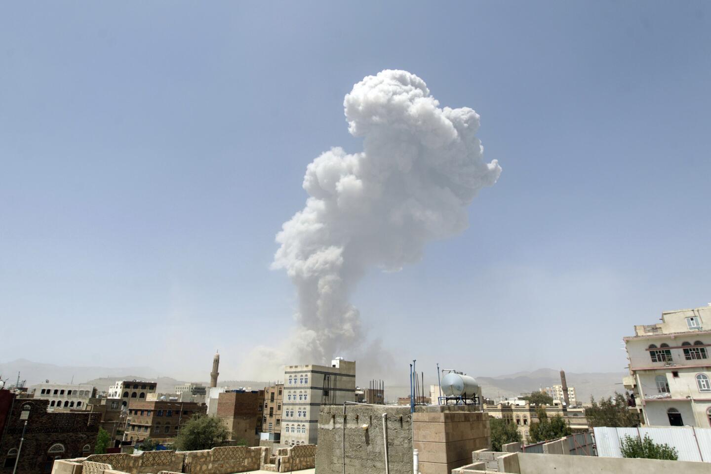 Smoke billows from the Faj Attan Hill after a reported airstrike by the Saudi-led coalition on an army arms depot, now under Huthi rebel control, on April 20, 2015, in Sanaa, Yemen.