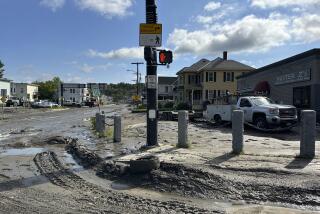 Mud and debris covers roads in Barre, Vt., on Thursday, July 11, 2024, after the remnants of Hurricane Beryl caused flooding. (AP Photo/Lisa Rathke)