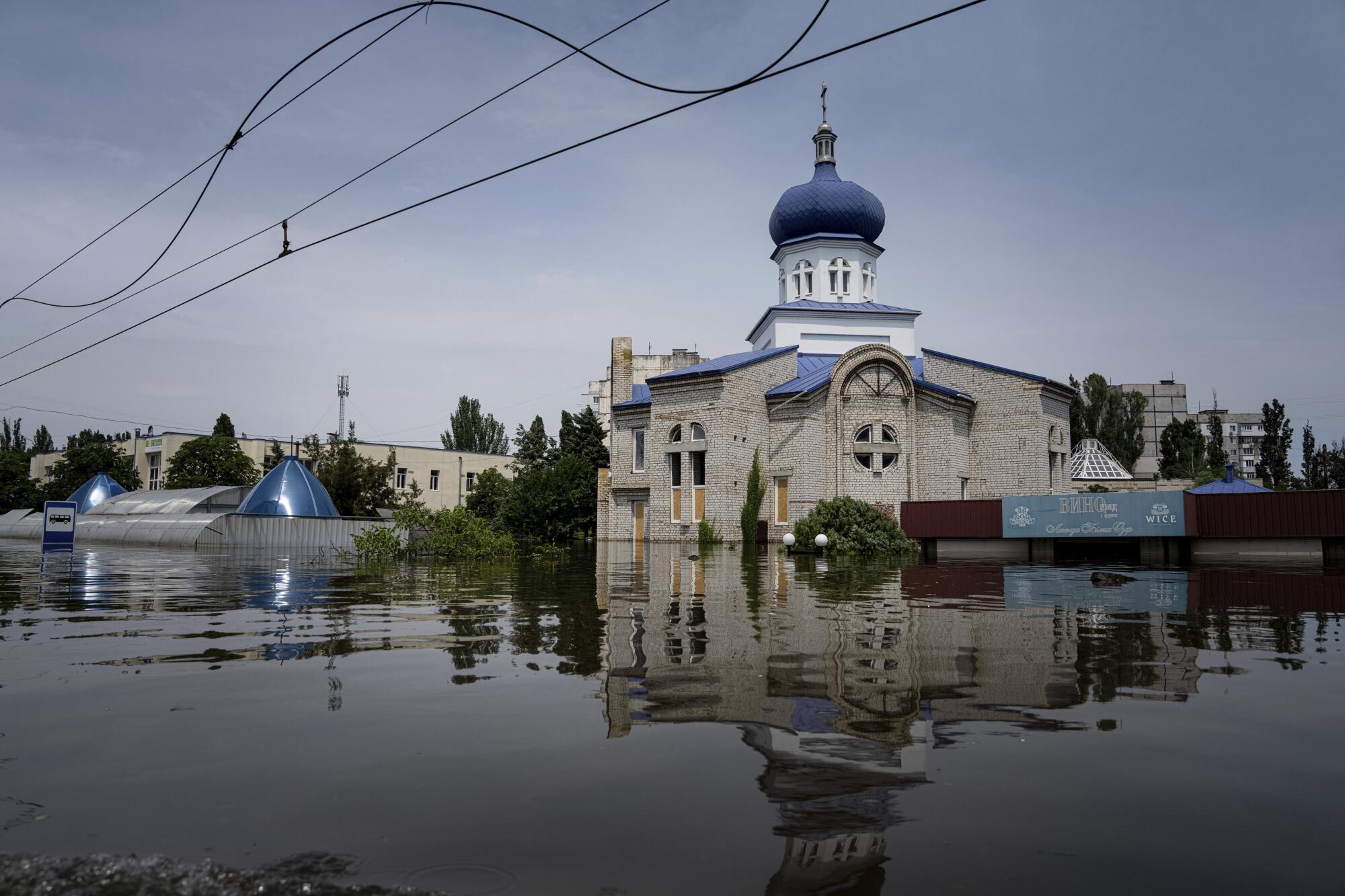 A church is surrounded by water in Ukraine. 