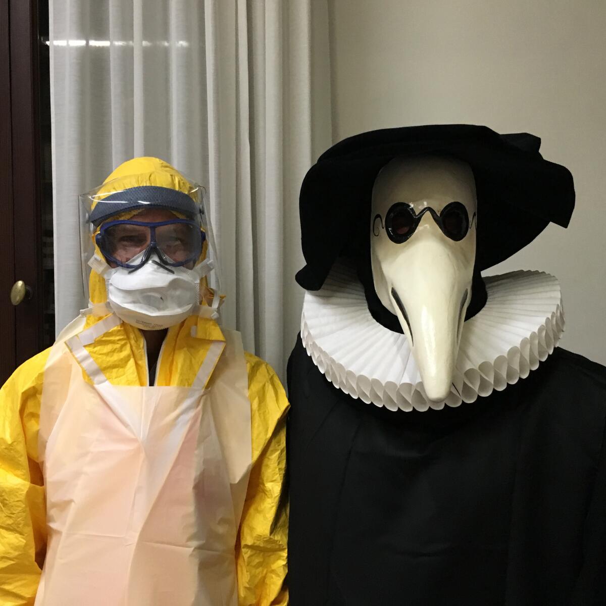 Geoff Manaugh and Dr. Luigi Bertinato wearing plague gear from different eras.