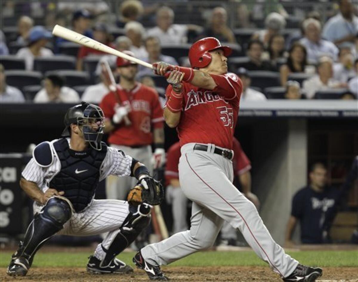 New York Yankees Hideki Matsui connects with the baseball in second inning  against the Boston Red