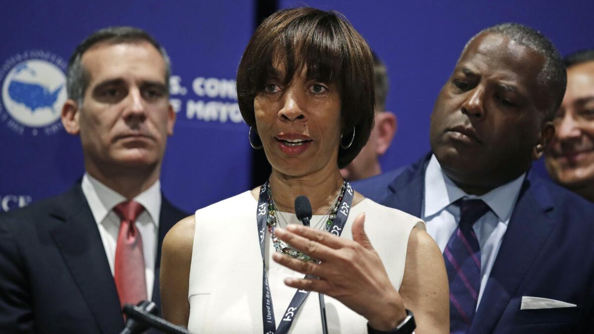 Baltimore Mayor Catherine Pugh addresses a gathering during the U.S. Conference of Mayors in Boston last year.