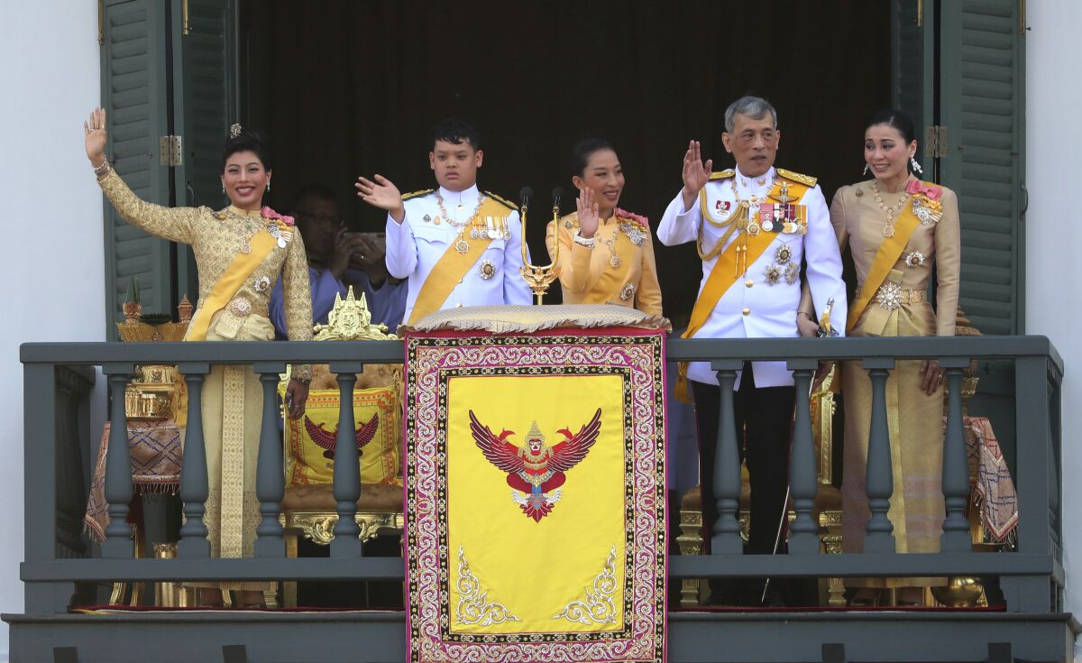 Thailand's royal family is seen on the balcony of the Grand Palace in Bangkok