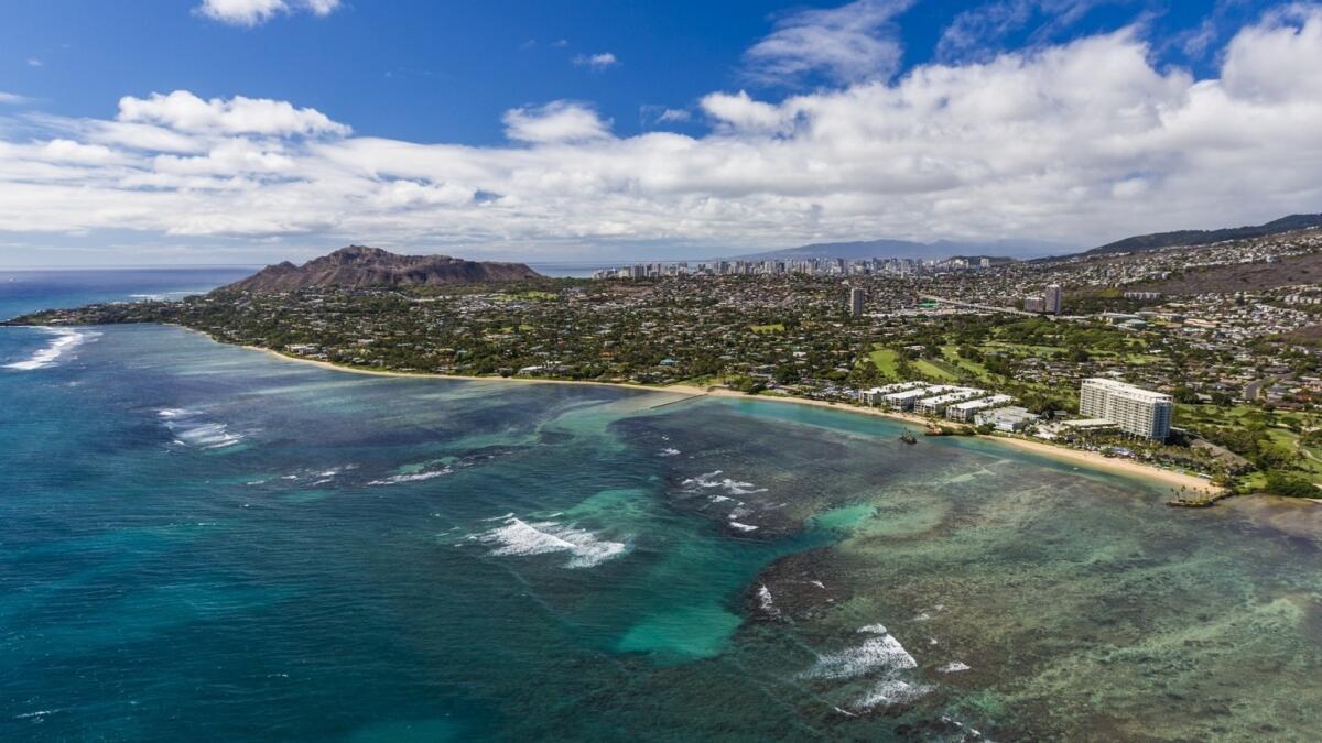 With Diamond Head in the distance, the coast road, Kalanianaole Highway, links Honolulu with the south shore community of Hawaii Kai. Runners in the Dec. 13 Honolulu Marathon will head in this direction, but they're not the only ones who can see the sights.