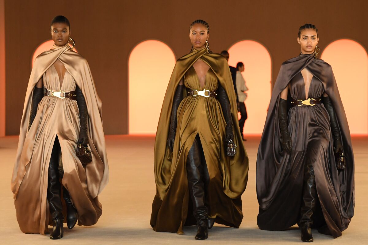 Capes on the Balmain AW20 runway