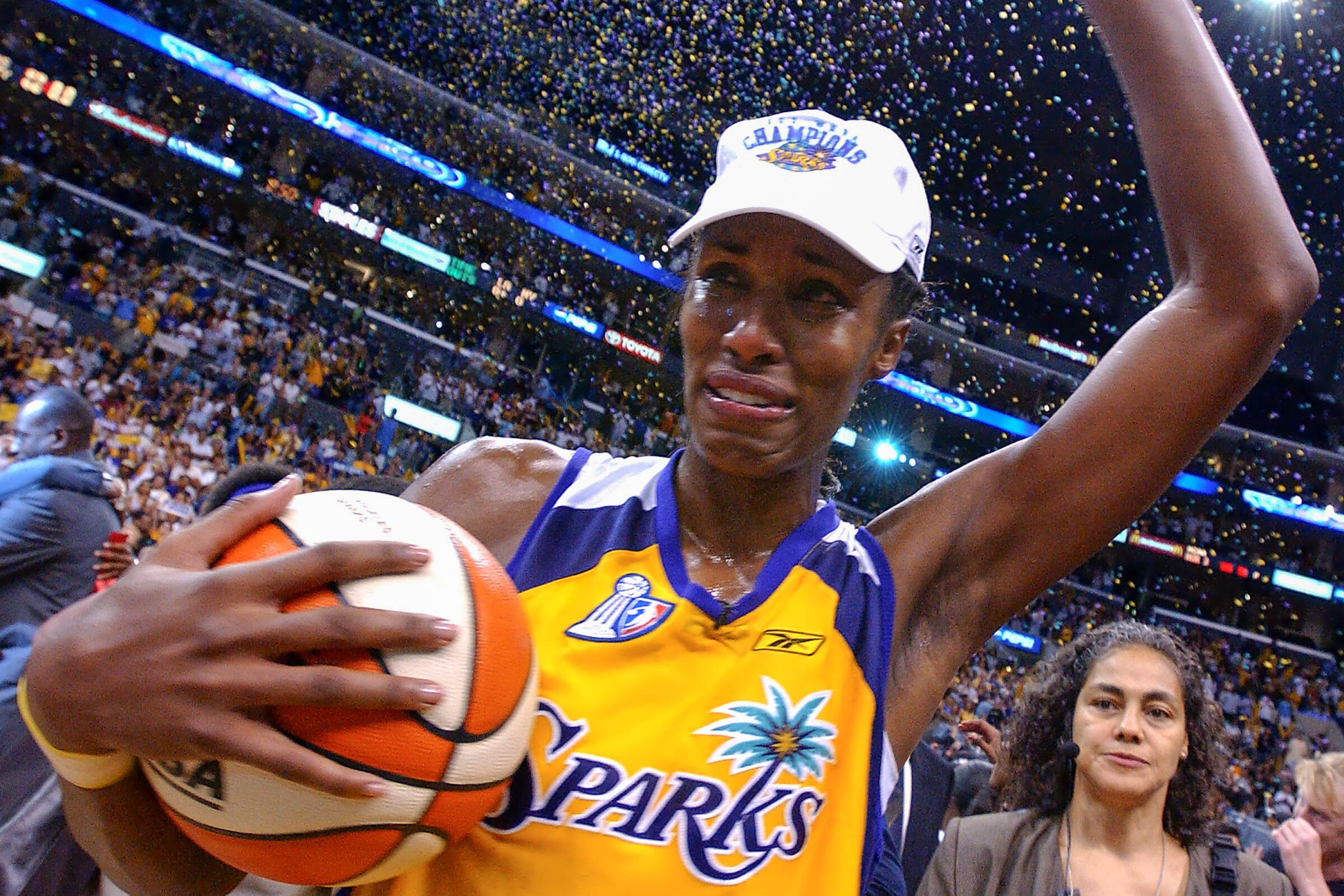Los Angeles Sparks' Lisa Leslie celebrates a win against New York Liberty 69-66 in the WNBA Finals championship in 2002.