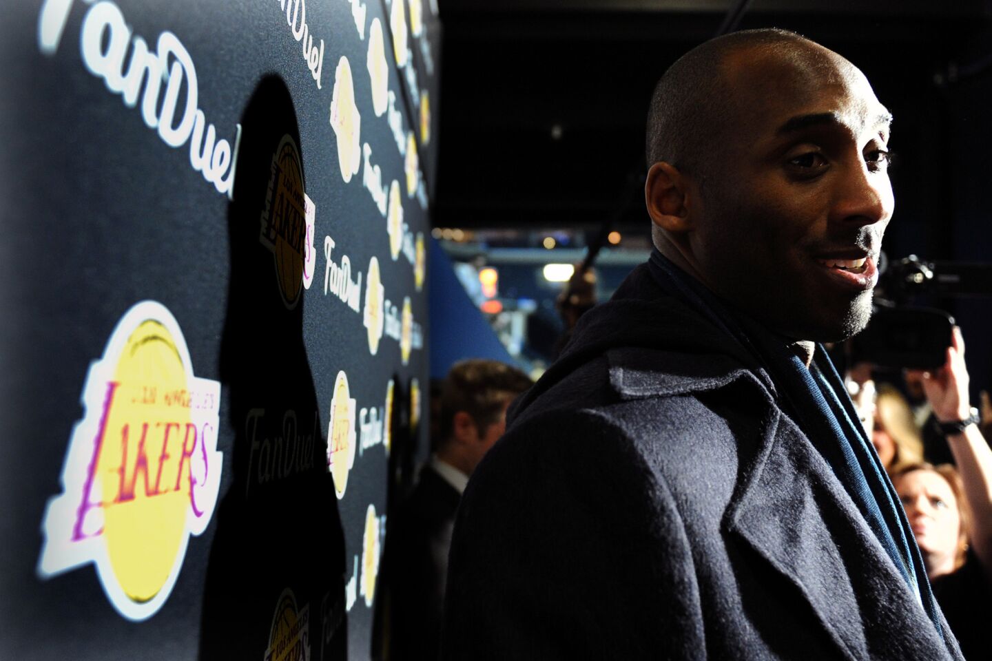 Kobe Bryant talks to the media before the Lakers played the Grizzlies in Memphis, Tenn., on Feb. 24, 2016.