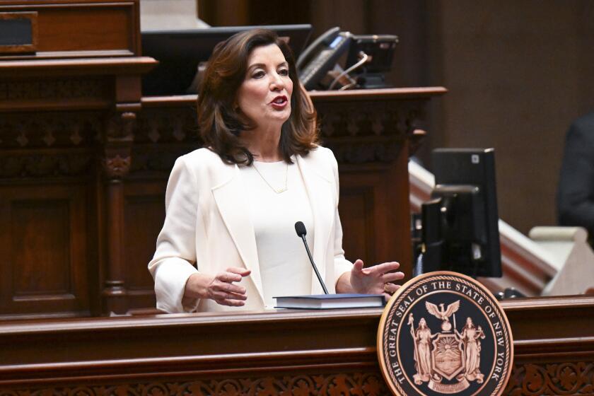 New York Gov. Kathy Hochul delivers her first State of the State address in the Assembly Chamber at the state Capitol, Wednesday, Jan. 5, 2022, in Albany, N.Y. (AP Photo/Hans Pennink, Pool)