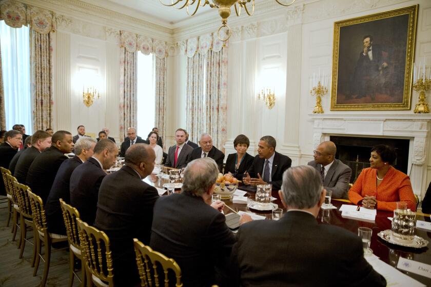 President Obama, third from right, meets with political, foundation and business leaders at the White House to discuss his new initiative.