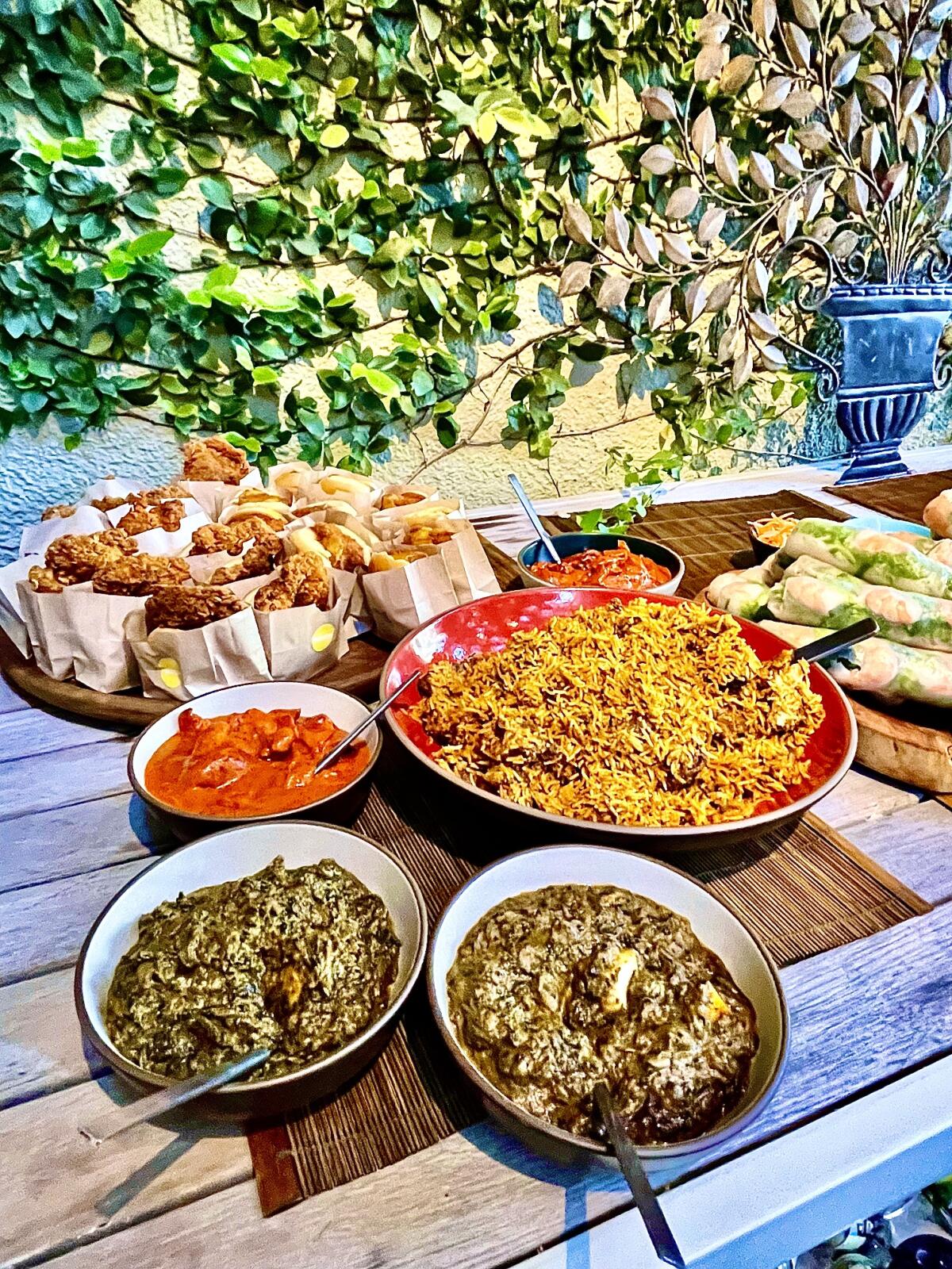 Some of the takeout foods at Nancy Silverton's potluck from Daybird, Quality of Bombay and Golden Deli.