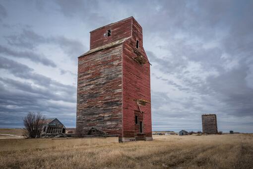 A photo of two old grain elevators in Neidpath, Saskatchewan, Canada