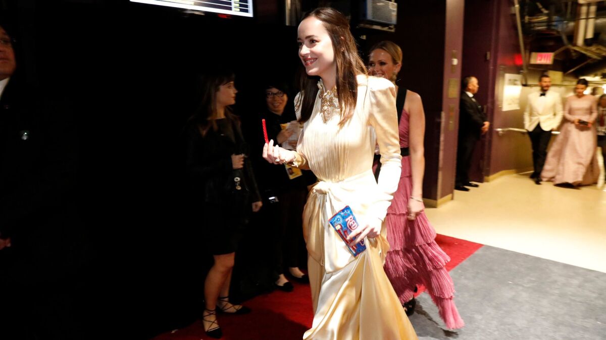 Dakota Johnson backstage at the 89th Academy Awards