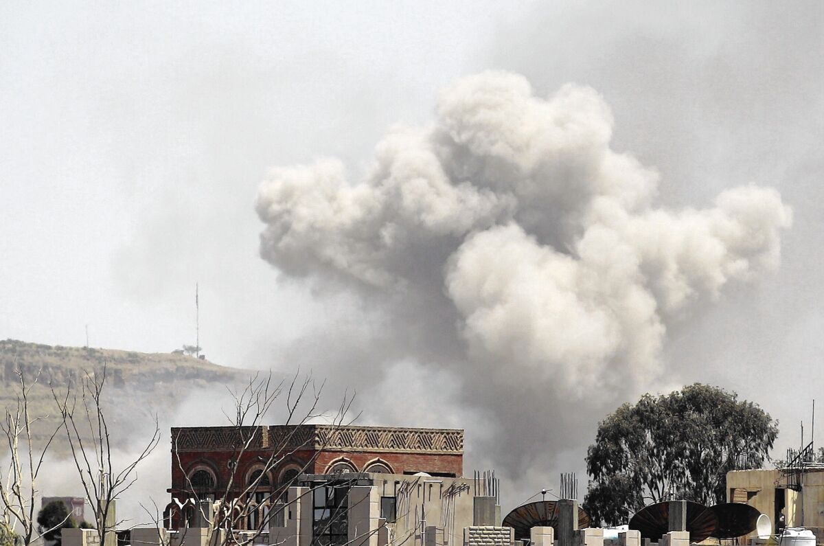 Smoke rises above the Alhva camp, east of the Yemeni capital, Sana, after airstrikes by a Saudi-led alliance.