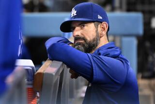 Dodgers pitching coach Mark Prior during a recent game at Dodger Stadium Monday. 