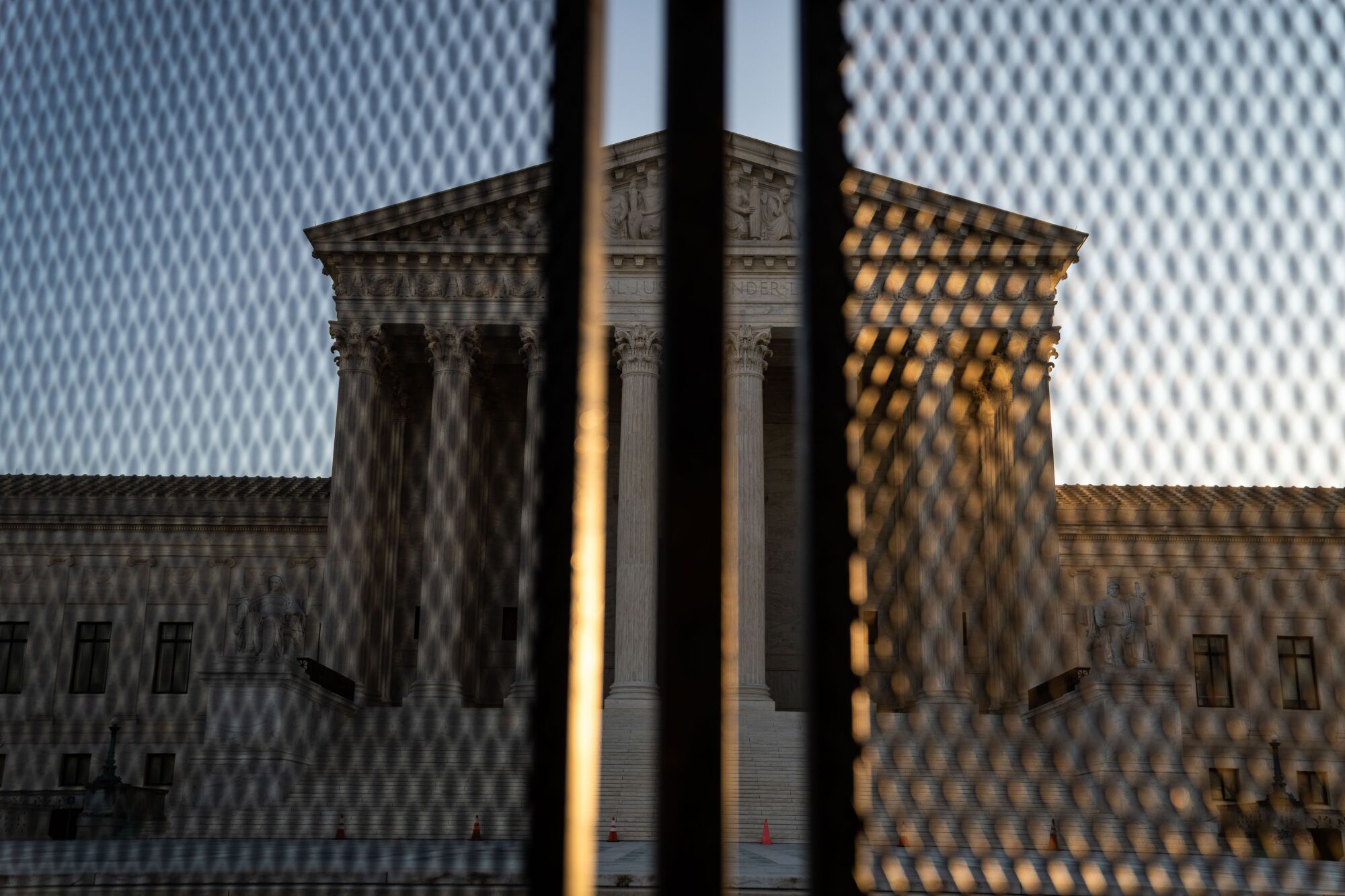 The Supreme Court, behind security fencing, on Saturday in Washington.