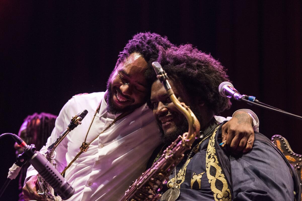 Terrace Martin, left, and Kamasi Washington perform at Club Nokia on Dec. 10, 2015 in Los Angeles