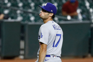 Dodgers pitcher Joe Kelly makes his now-famous pouty face toward Houston's Carlos Correa