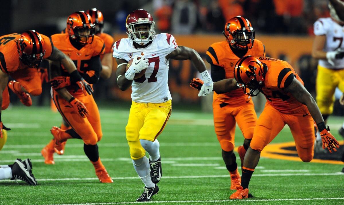USC running back Javorius Allen breaks into the open for a 52-yard touchdown run against Oregon State in November.
