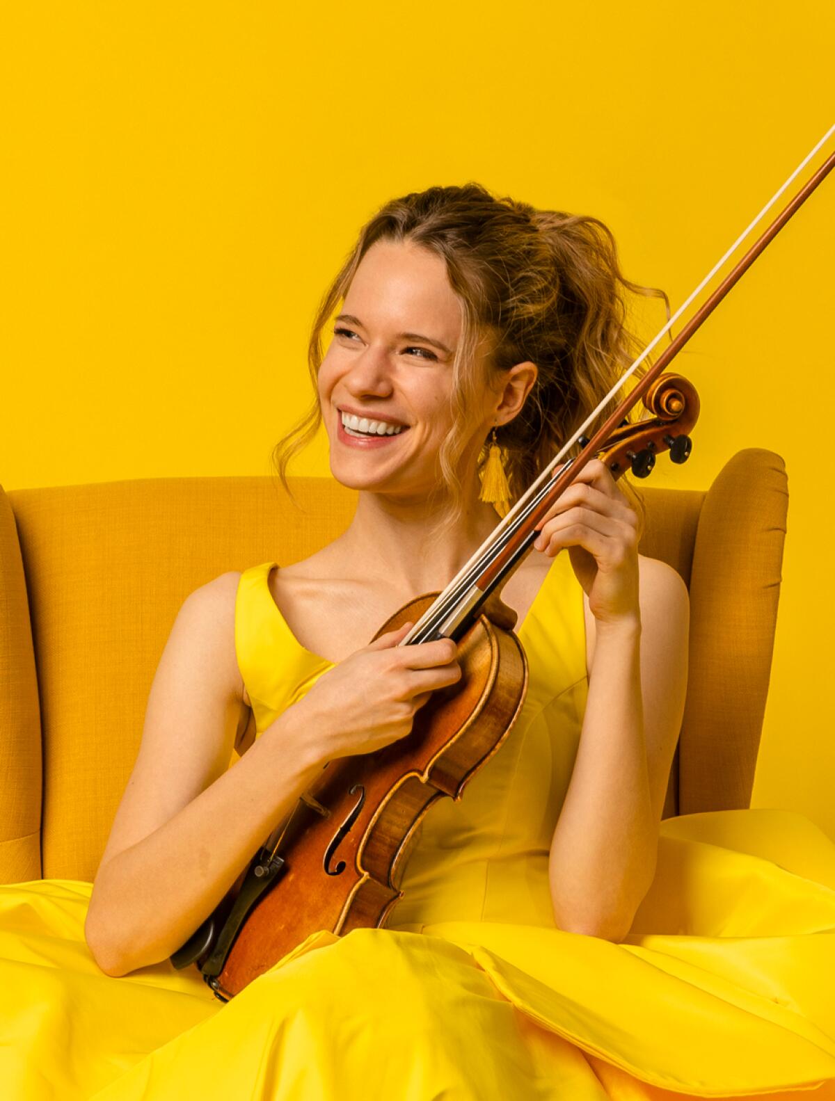 Violinist Aubree Oliverson plays alongside Anne Akiko Meyers on Feb. 17 at the Laguna Beach Music Festival.