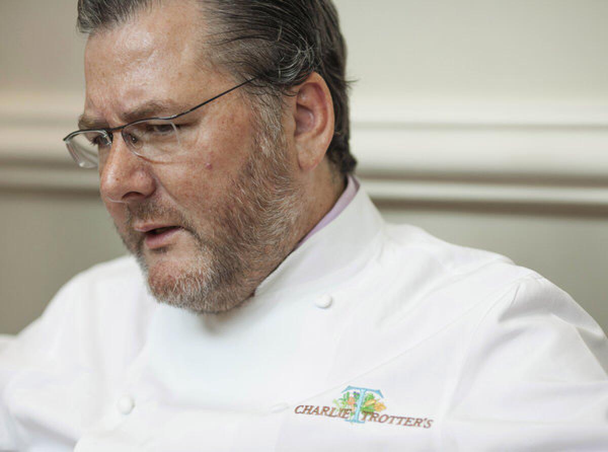 Charlie Trotter's death was not connected to a brain aneurysm and plane flights he'd taken, his wife says.