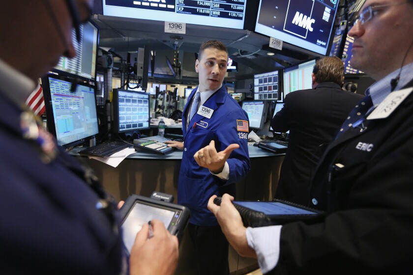 Traders on the floor of the New York Stock Exchange on Monday.