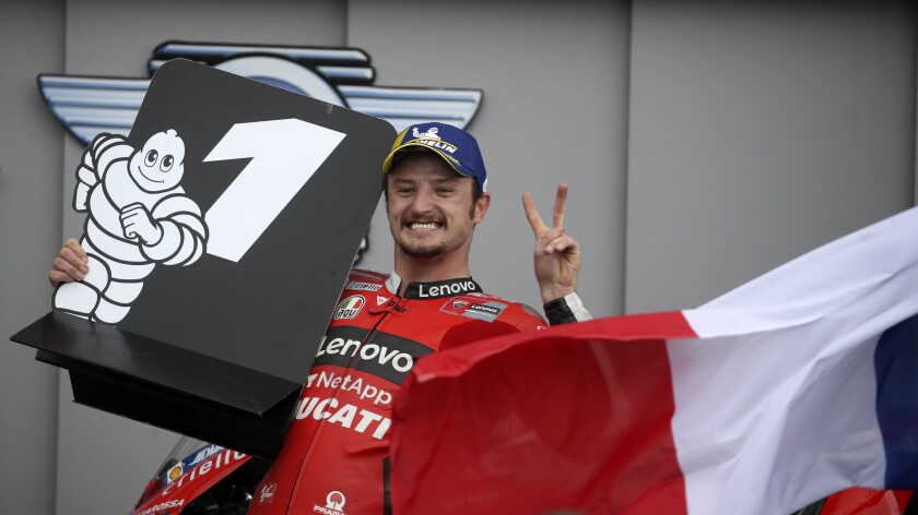 MotoGP rider Jack Miller of Australia celebrates after winning the French Motorcycle Grand Prix in Le Mans, France, Sunday, May 16, 2021. (AP Photo/David Vincent)
