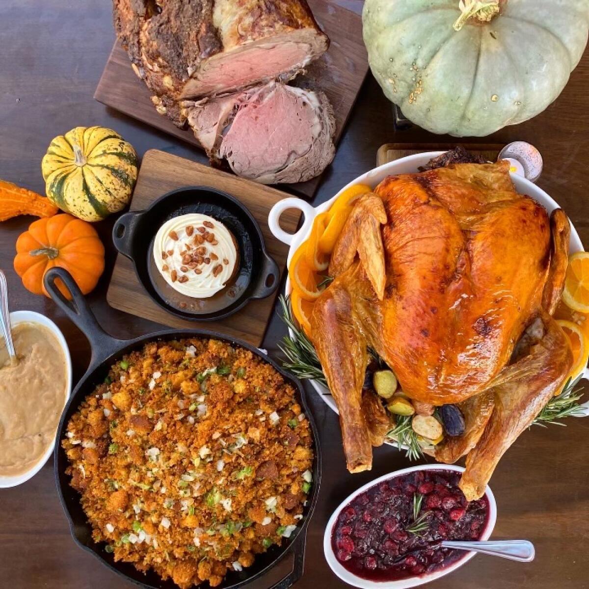 Bosscat’s Take Home Feast features a maple bourbon-brined turkey or brown sugar baked ham.
