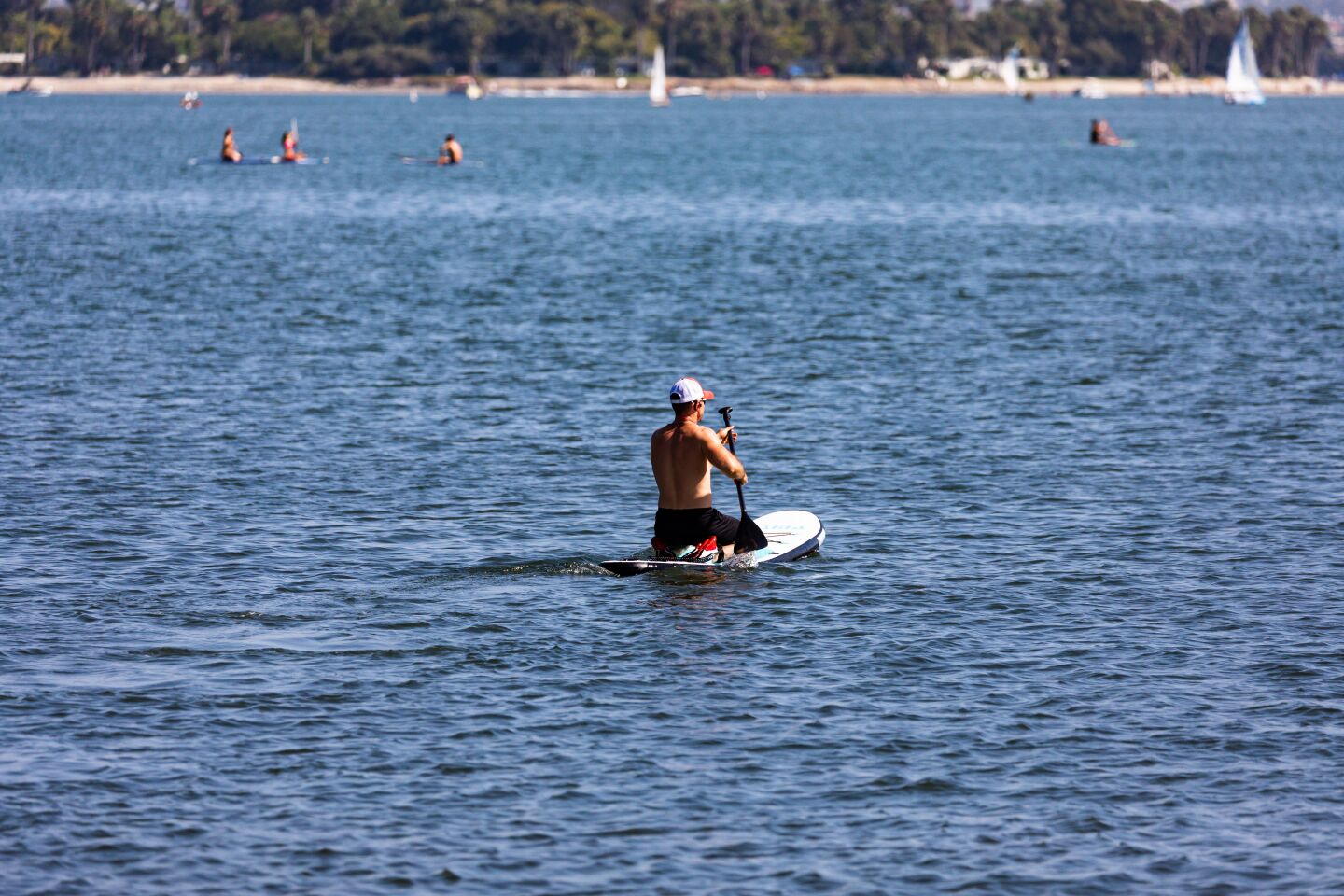 A paddler gets some space to himself on Sail Bay.
