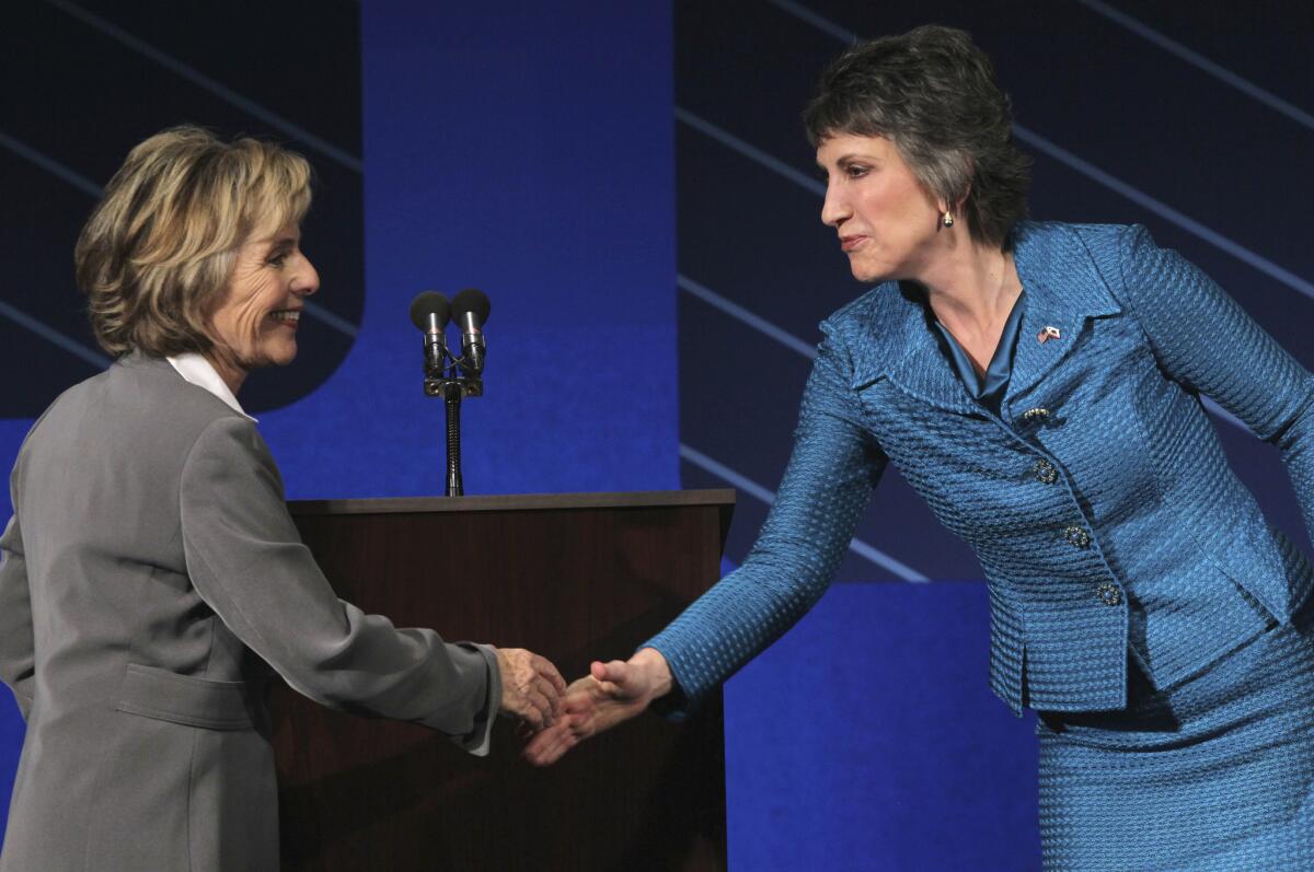 U.S. Sen. Barbara Boxer (D-Calif.), left, shakes hands with Republican challenger Carly Fiorina at the conclusion of a debate on the campus of Saint Mary's College in Moraga, Calif., in 2010.