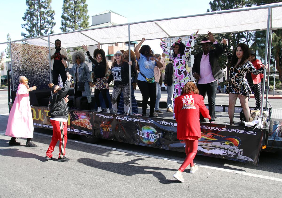 Soul Train dancers get the crowd going at the Orange County Black History Parade. 