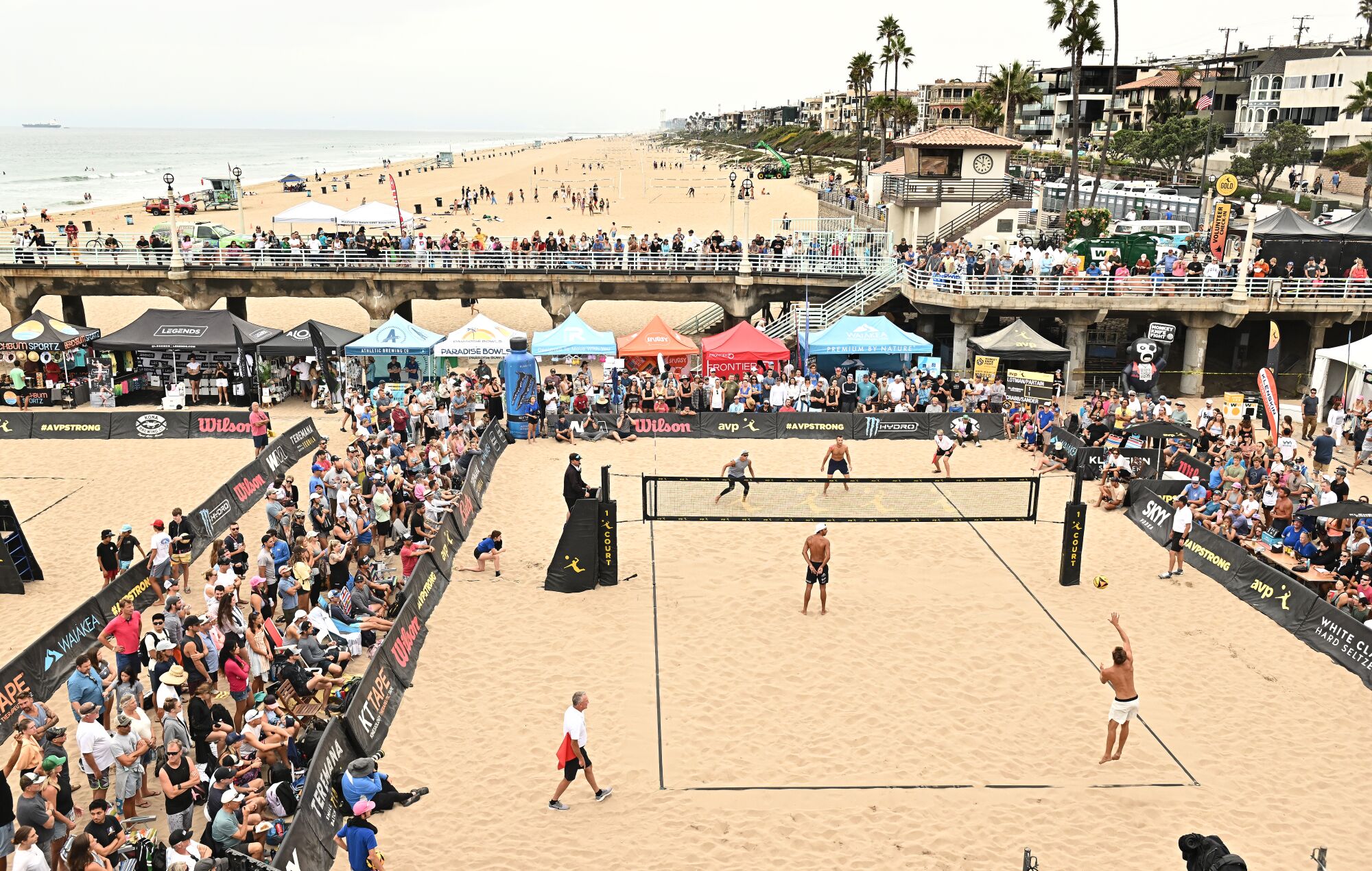 Fans watch a match at the AVP Manhattan Beach Open.