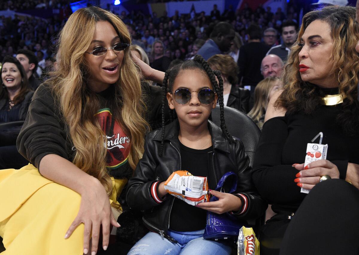 Beyoncé, left, with Blue Ivy Carter and Tina Knowles in 2018