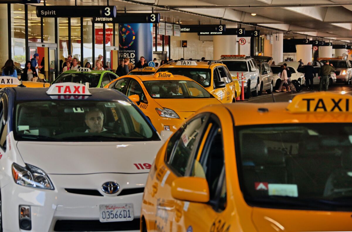 Taxis pass through the central terminal area of Los Angeles International Airport.