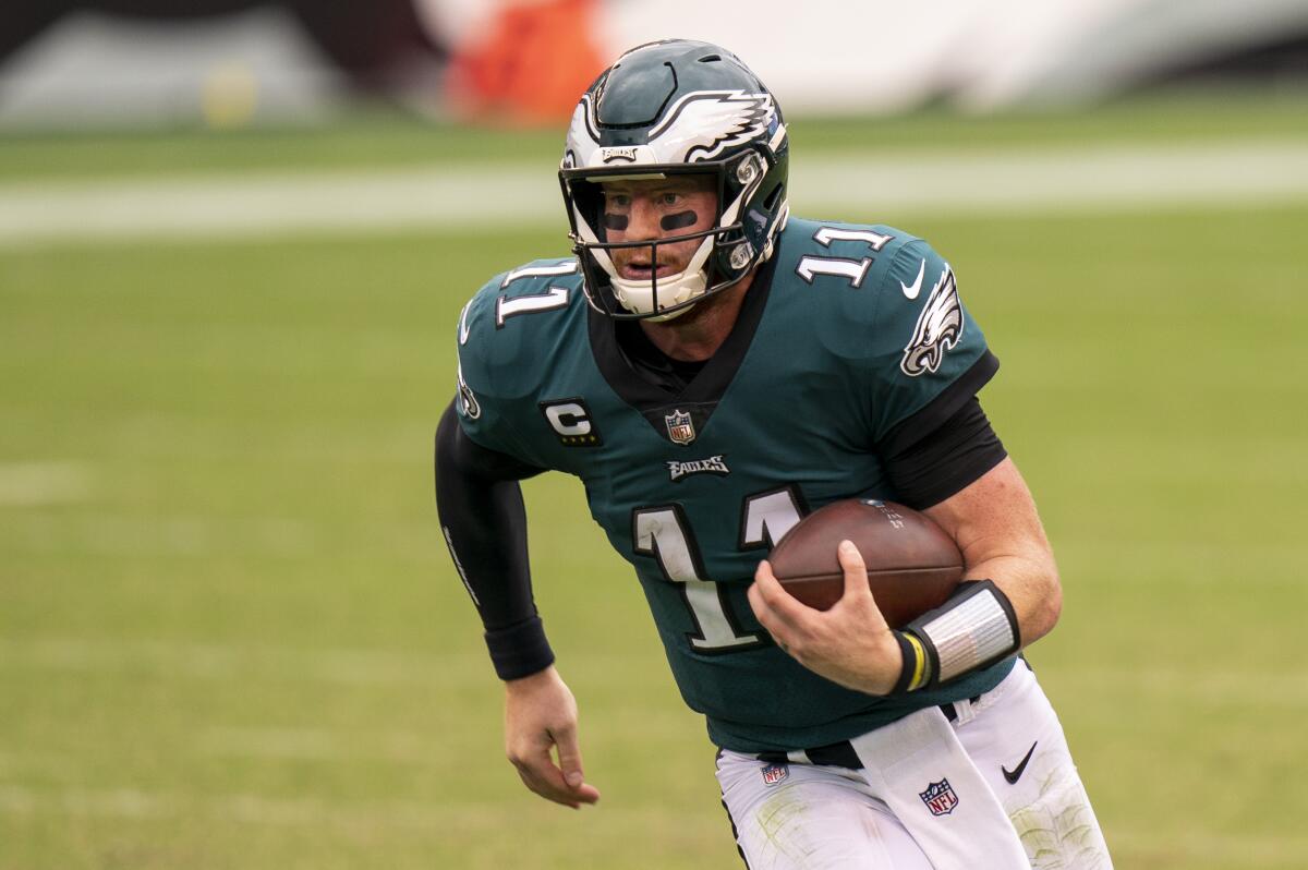 Philadelphia Eagles quarterback Carson Wentz carries the ball against the Cincinnati Bengals on Sept. 27.