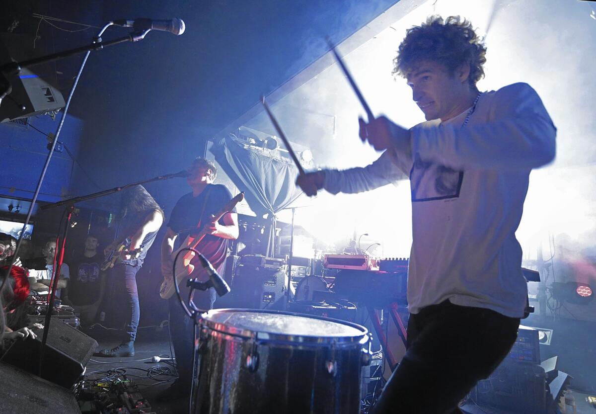 Health’s John Famiglietti, from left, Jacob Duzsik and Jupiter Keyes at the Echo in July.