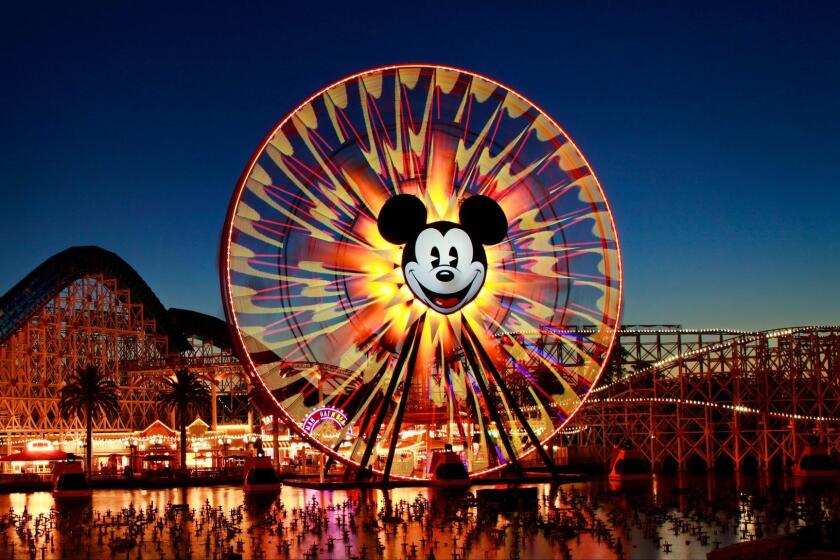 Clendenin, Jay   ANAHEIM, CA FEBRUARY 02, 2011Mickey's Fun Wheel and the California Screamin' roller coaster are seen at dusk at Disney California Adventure Park, in Anaheim, Ca., Feb. 2, 2011. (Jay L. Clendenin/Los Angeles Times)