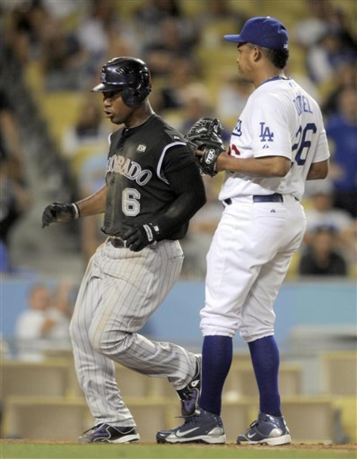 Scott Podsednik attempts to lay down a bunt during the game