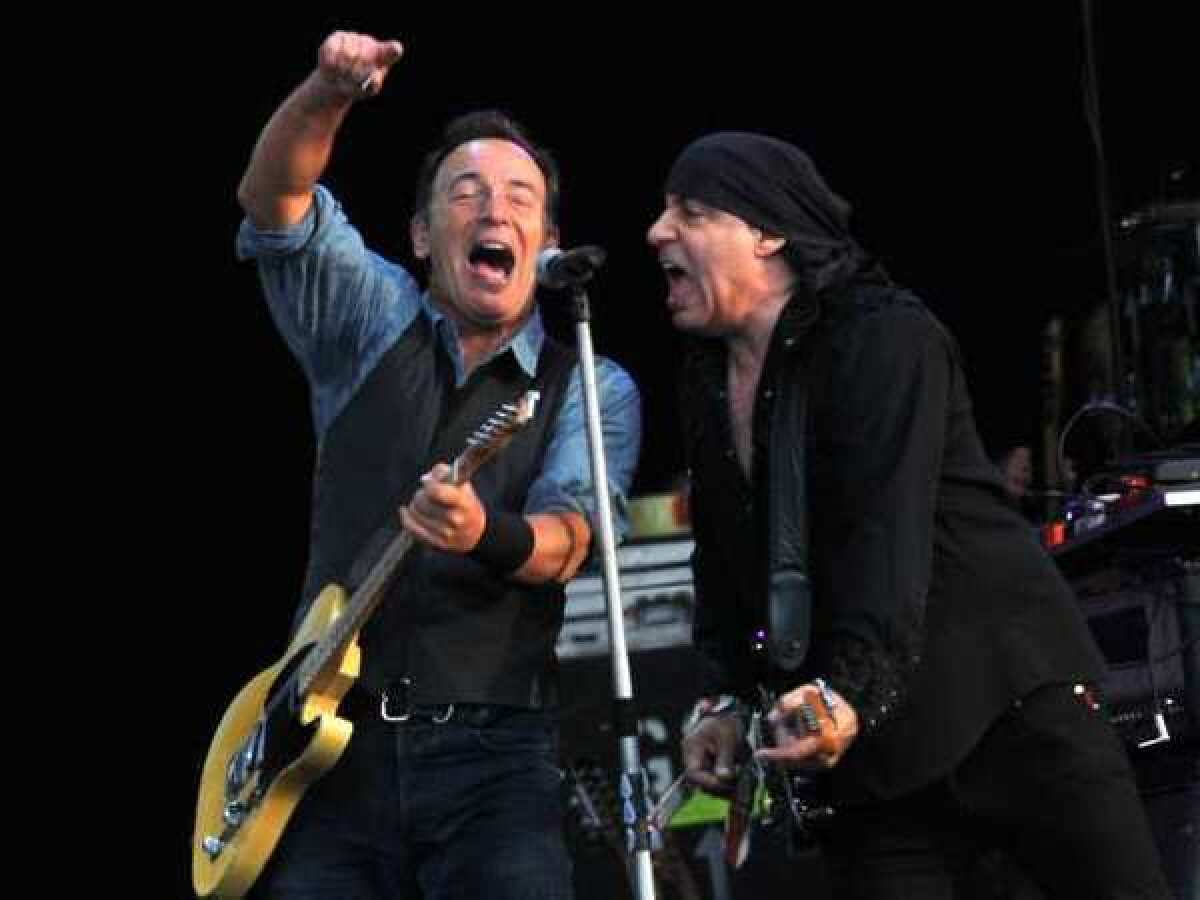 Bruce Springsteen, left, and guitarist Steve Van Zandt perform during Saturday's Hard Rock Calling Festival in London's Hyde Park, were concert officials pulled the plug after Springsteen broke curfew.