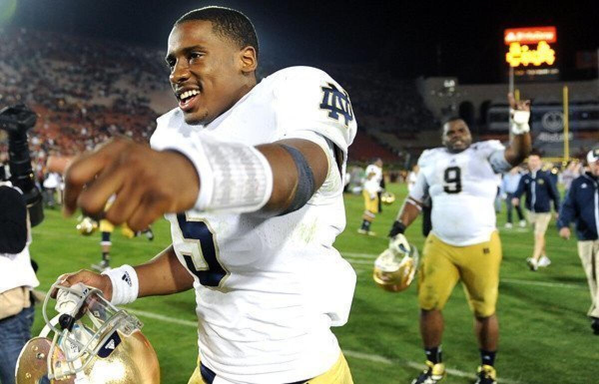 Notre Dame quarterback Everett Golson celebrates after the Irish defeated USC at the Coliseum in 2012.