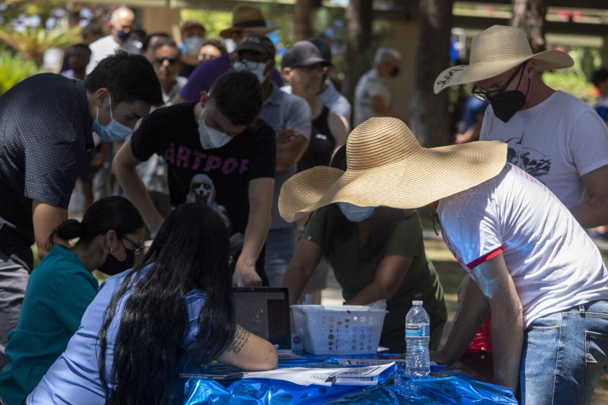 A crowd of people at a table