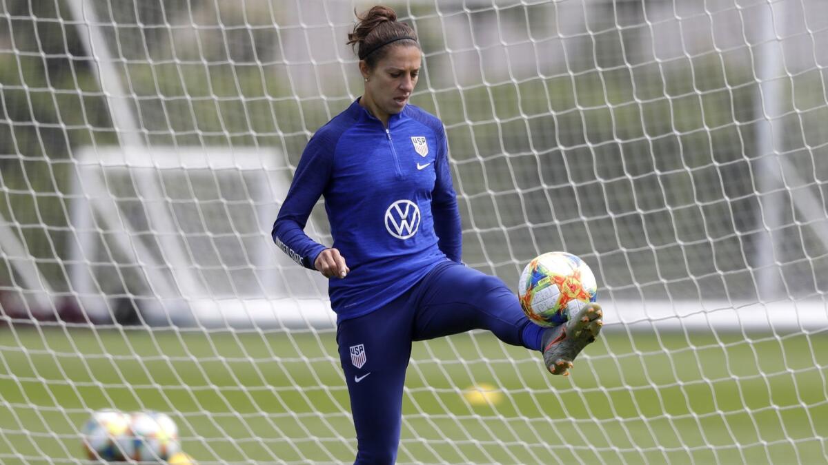 Carli Lloyd warms up during a training session at the Tottenham Hotspur facility in London earlier this week.