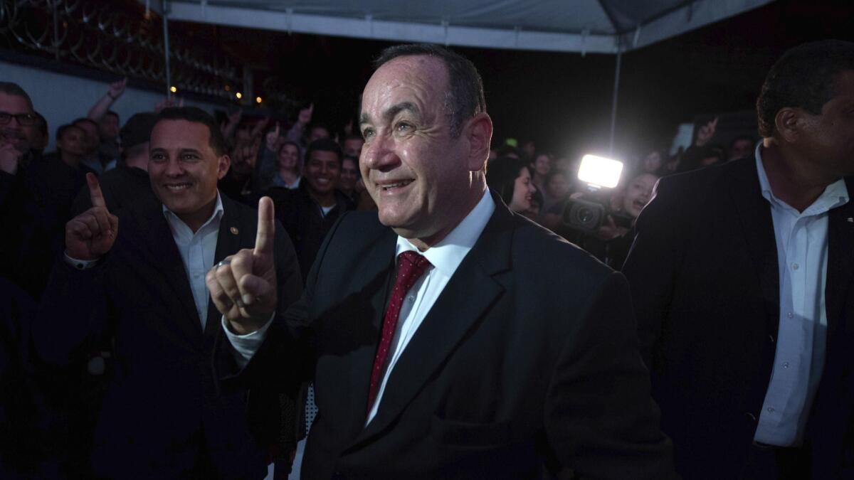 Alejandro Giammattei, presidential candidate of the Vamos party, arrives at his campaign headquarters.