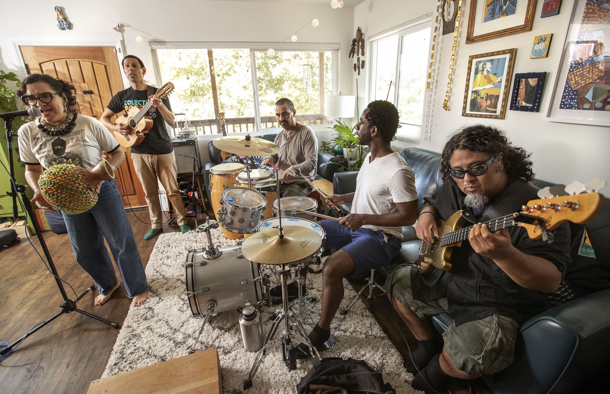 l-r; Dr. Martha Gonzalez, her husband Quetzal Flores, Alberto Lopez, Evan Greer, and Juan Perez, members of the band Quetzal.