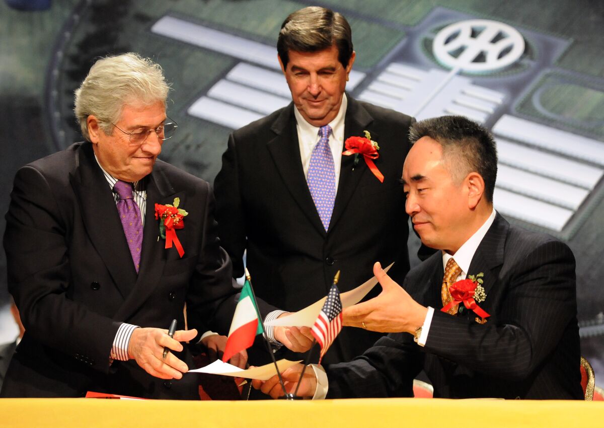 Italdesign Giugiaro Chairman Giorgetto Giugiaro, left, and Hybrid Kinetic Motors Corp. Chairman Yung Yeung