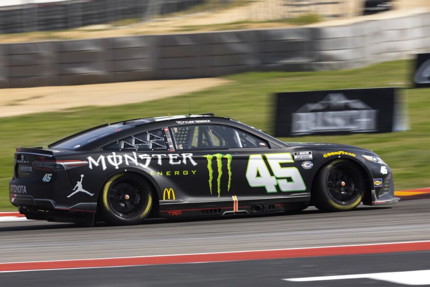Tyler Reddick steers through Turn 15 during a NASCAR Cup Series auto race at Circuit of the Americas, Sunday, March 26, 2023, in Austin, Texas. (AP Photo/Stephen Spillman)
