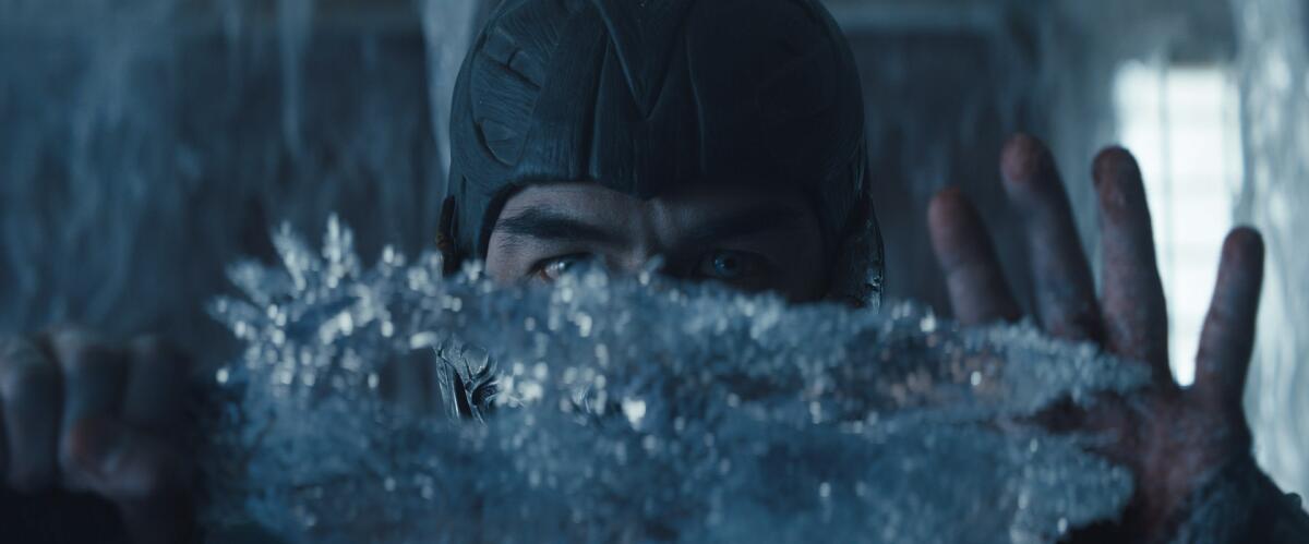 Joe Taslim as Sub-Zero in "Mortal Kombat" manipulates ice.