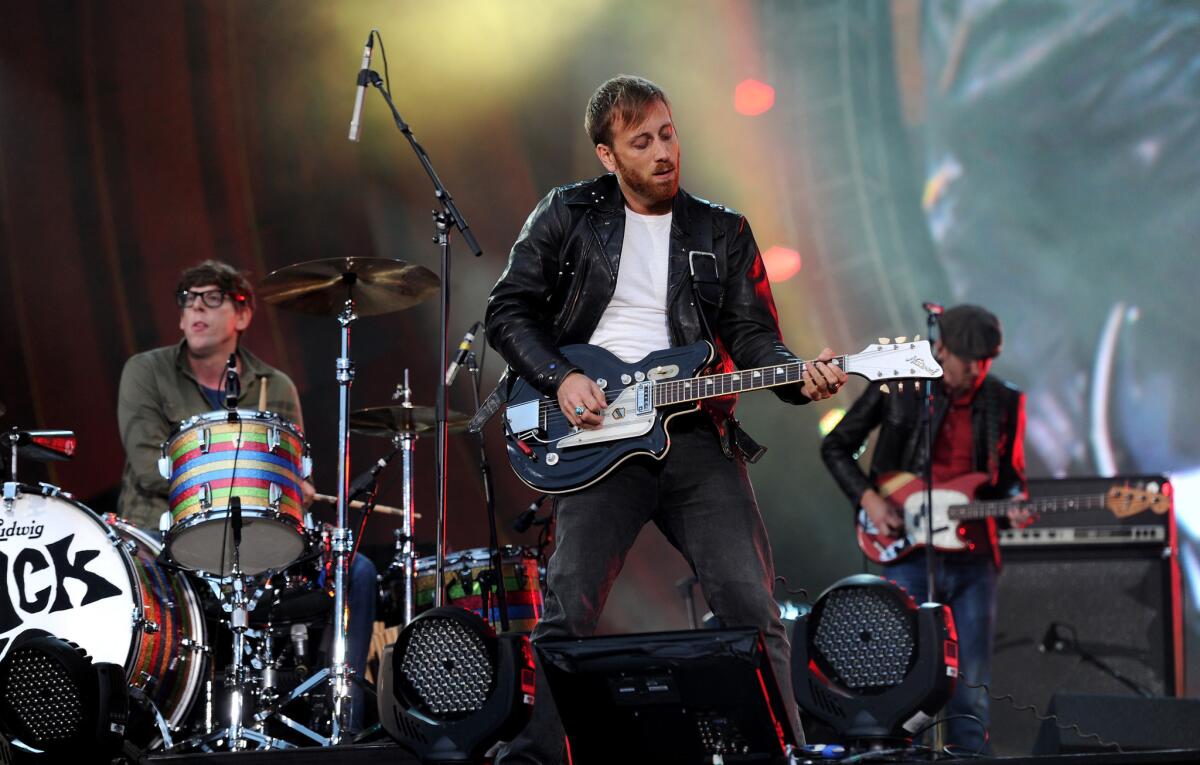 The Black Keys, shown performing in New York's Central Park in 2012, will headline the 2013 KROQ Weenie Roast on May 18 in Irvine.