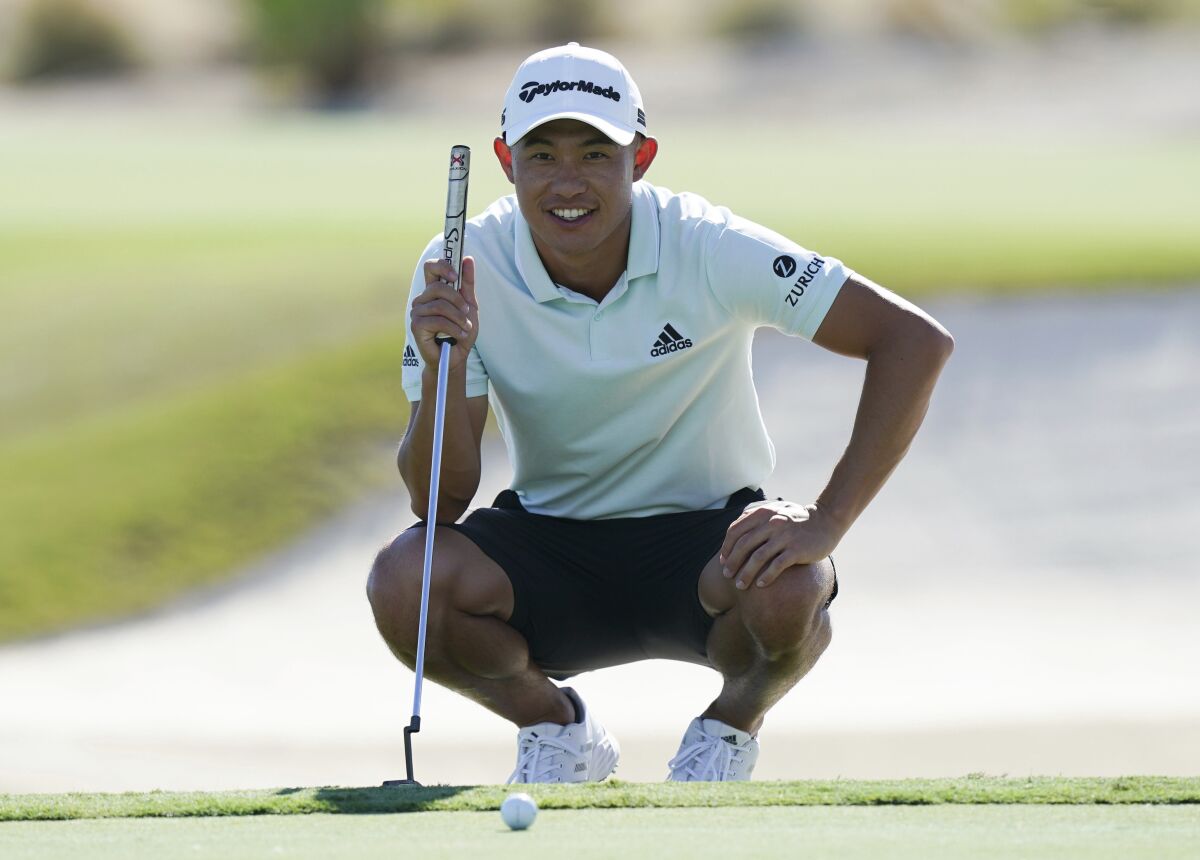 Collin Morikawa of the United States, studies his putt on the 18th hole during a Pro-Am tournament ahead of the Hero World Challenge PGA Tour at the Albany Golf Club, in New Providence, Bahamas, Wednesday, Dec. 1, 2021.(AP Photo/Fernando Llano)