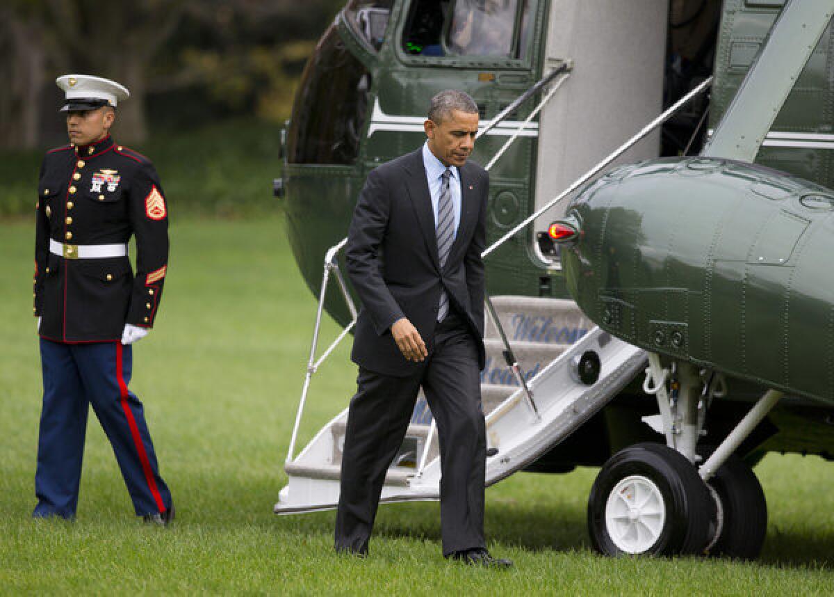 President Obama's recently announced proposal to develop a college rating system was met with skepticism Wednesday at a forum at Cal State Dominguez Hills. Above, the president walking Tuesday from Marine One on the South Lawn of the White House.